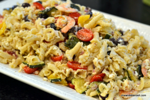 Green Pasta Salad with Shrimp Tomatoes Zucchini Peppers and Feta - Chew Nibble Nosh